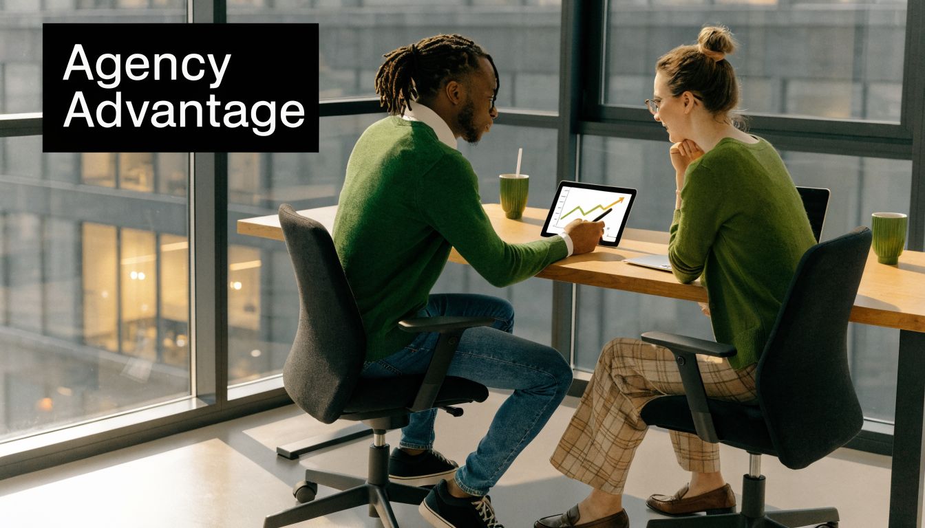 A professional man and woman discussing business growth trends on a tablet in a modern office.